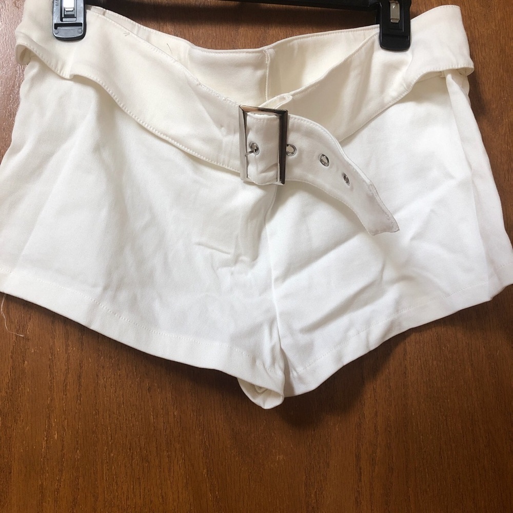 White short shorts with chunky belt attached